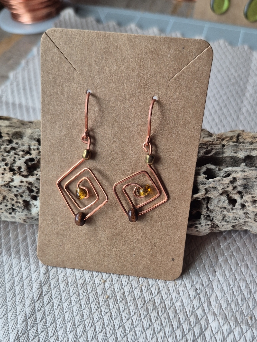 Copper Spiral Drop Earrings with Amber and Brown Bead Accents
